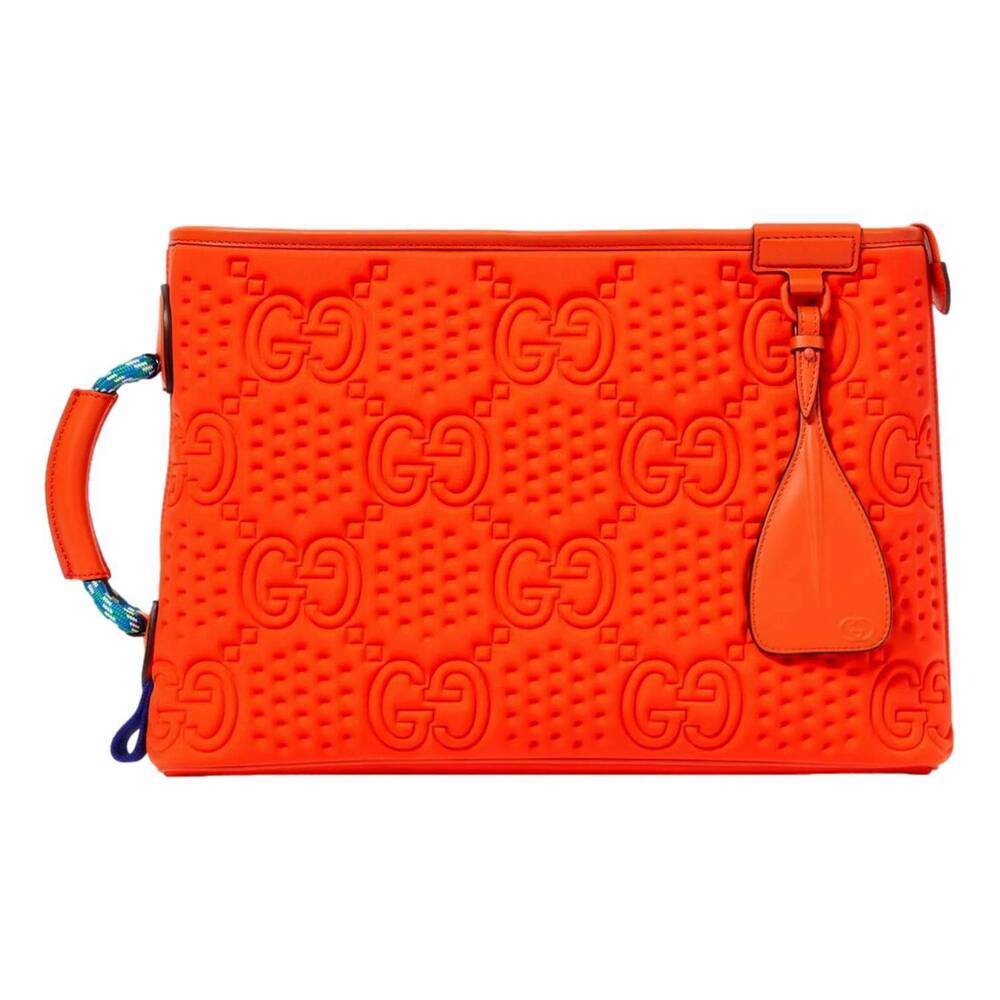 NEW GUCCI women's off the grid gg embossed rubber pouch clutch bag in orange